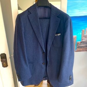 Dark blue pinstripe Suitsupply Havana 2 button suit